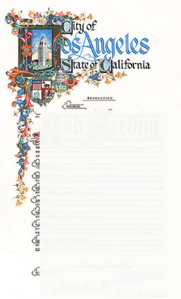 Ornate certificate with decorative floral border, the Los Angeles City Hall, and the text City of Los Angeles State of California at the top, above a partially visible document referencing Santa Barbara County.