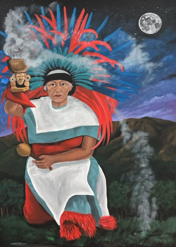 A person in traditional Aztec attire with a feathered headdress kneels on grass at night, holding a smoking incense burner under a full moon, with mountains and trees in the background.